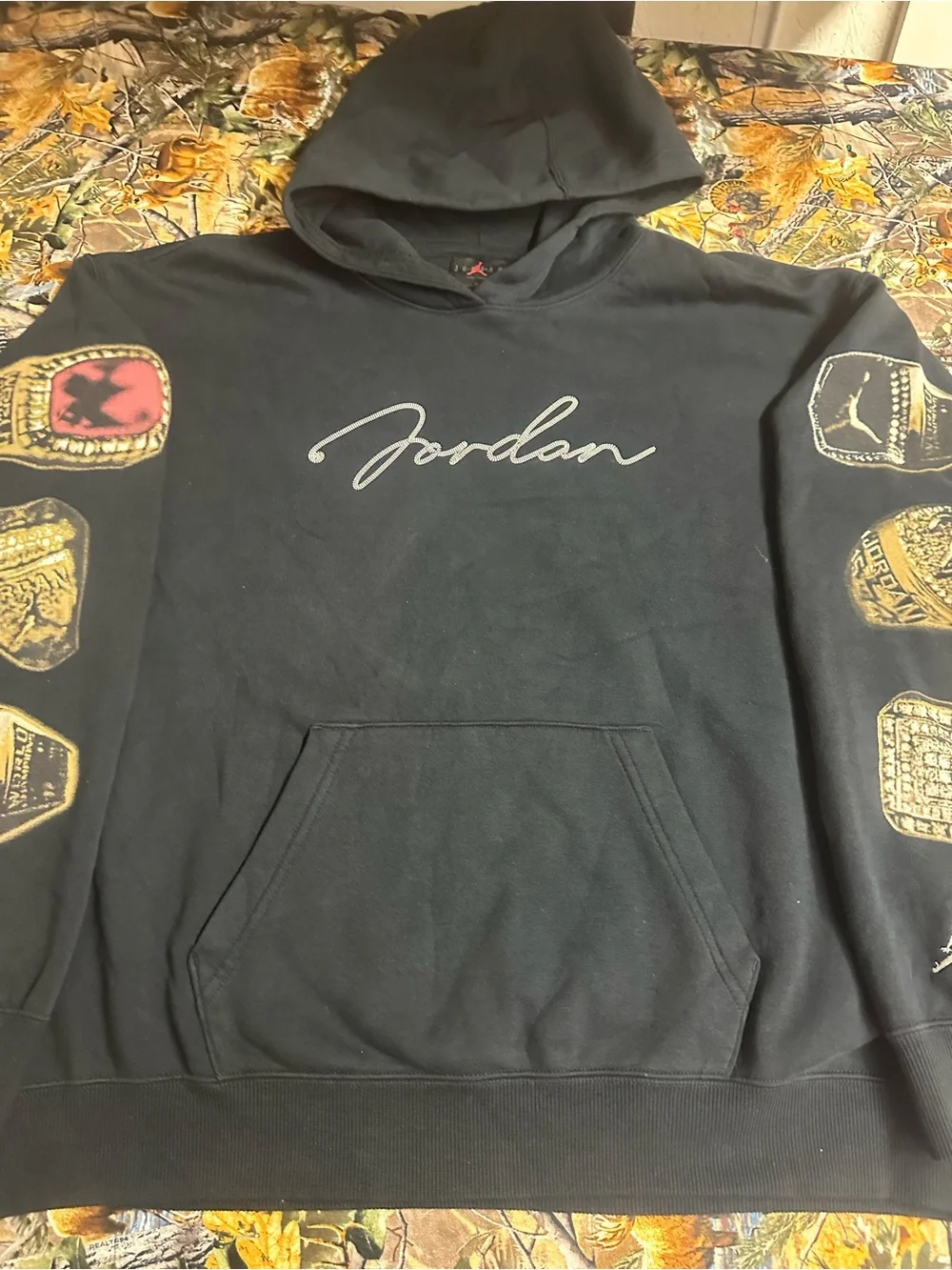 Jordan Black Hoodie with Script Logo and Gold Ring Sleeve Graphics
